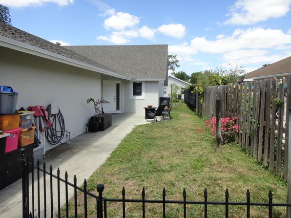 935 Country Wood Court #935-937, Wellington, FL 33414