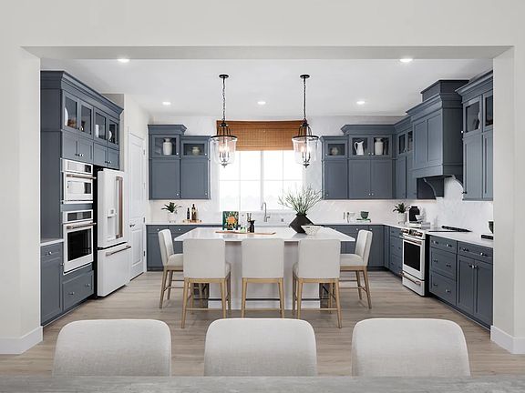 Kitchen with pendant lighting and glass upper cabinets