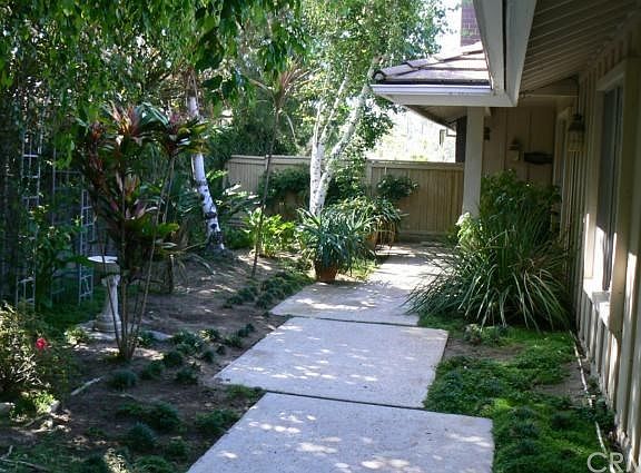 Lush court yard awaits you and give you a tranquil feeling as you look out windows and when your guests arrive for visits