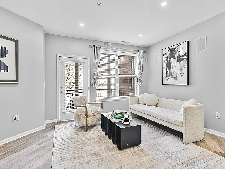 Step into sophistication with this elegantly designed modern living room.