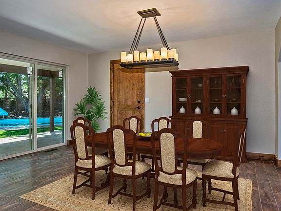Dining room opens to pool