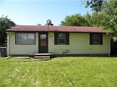 Front of home, nice front yard and back yard is fenced.