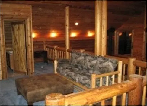 Upstairs living room and access to upstairs full bath.