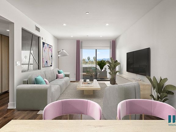 Open-Concept Dining and Living Room with Built-In Cabinets and Patio