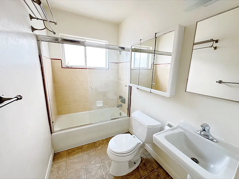 Full bathroom with 2 medicine cabinets and an overhead heat lamp!