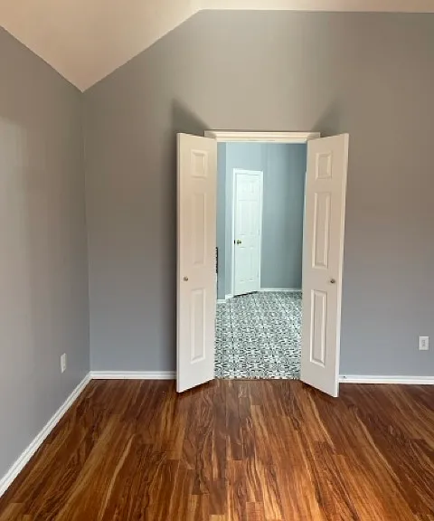 Master bedroom leading into master bathroom.