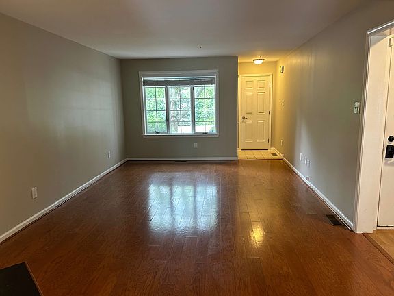 Enter front door into your large living room