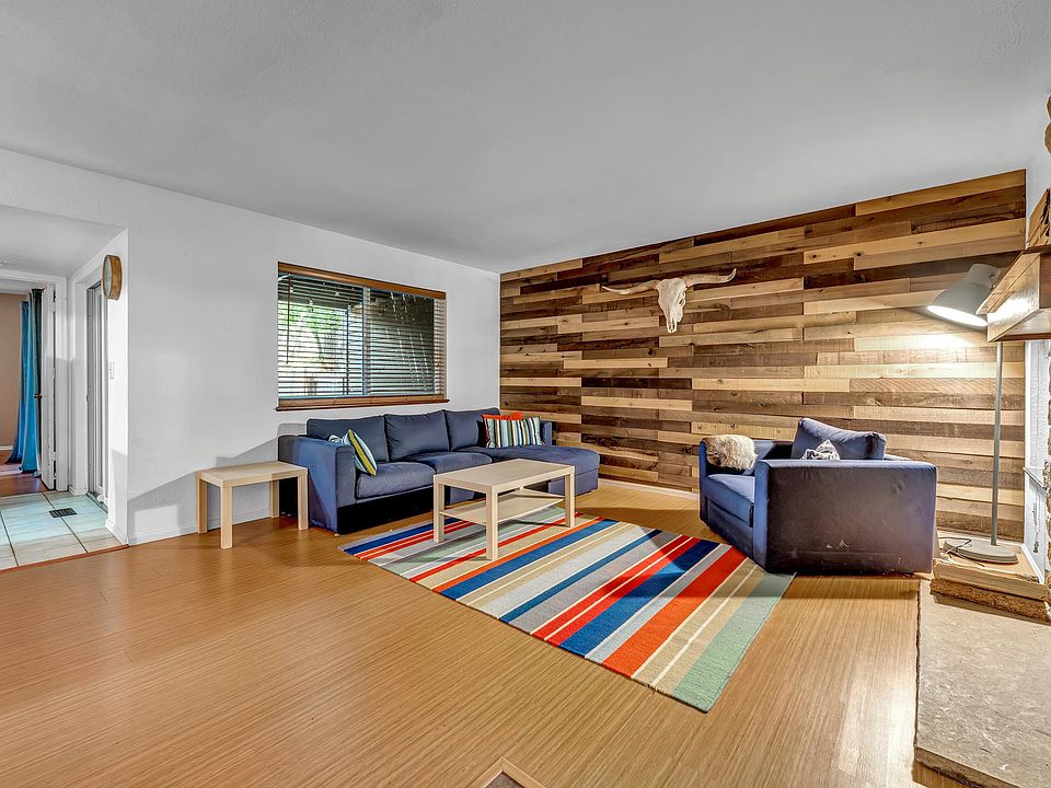 The living room has a fireplace.