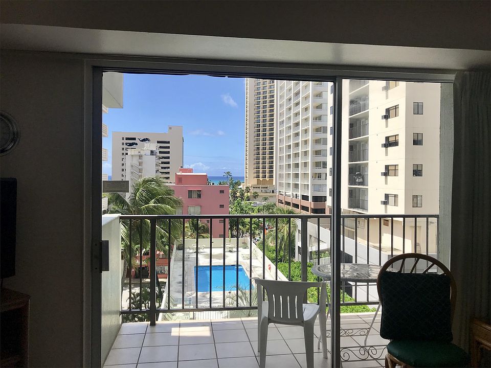 Ocean and pool view from inside apartment