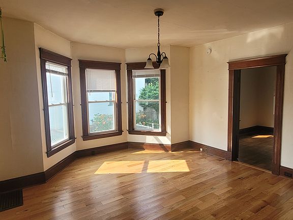Living room with view of back bedroom