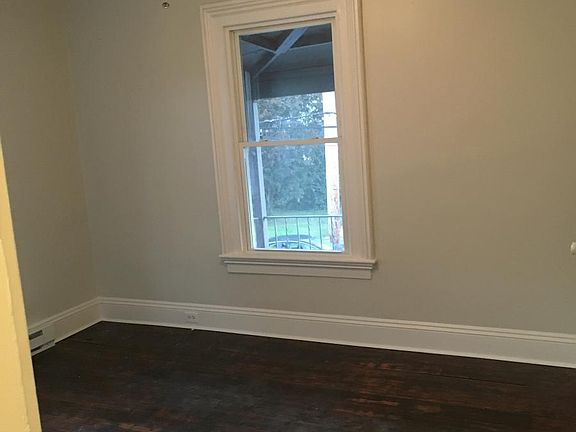 Bedroom with hardwood floors
