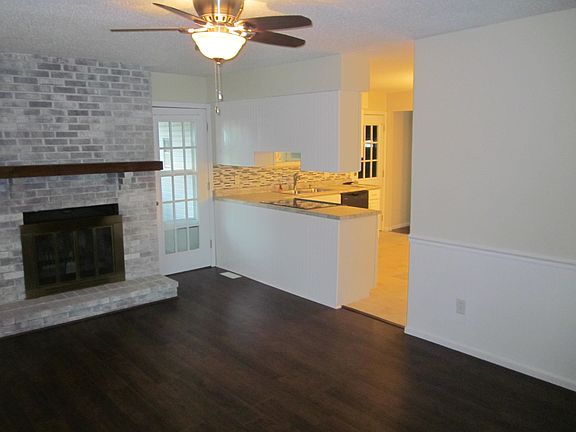 Family room with wood burning fireplace