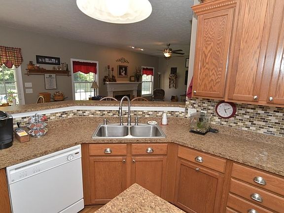 The breakfast bar extends seating from the kitchen table or family room.