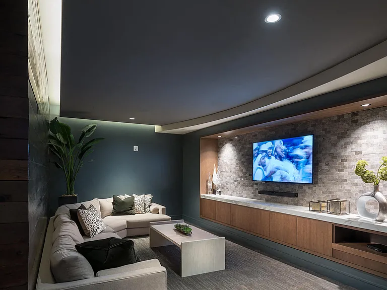 Host a movie night or game watch in the private screening room