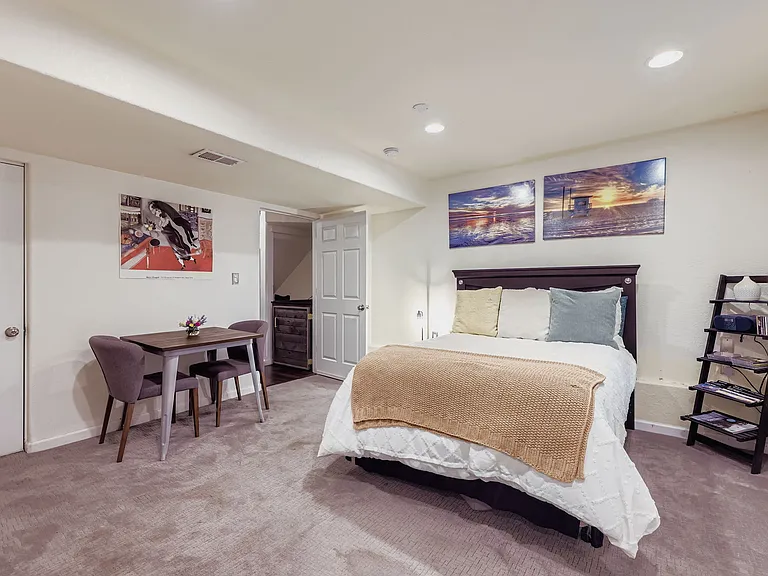Guest bedroom is large enough to function as bedroom plus office