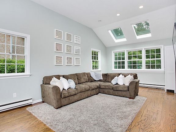 Sunny family room with high ceilings