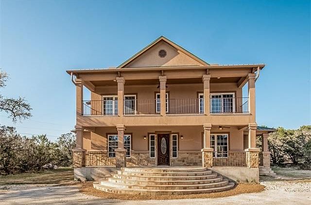 Stone and stucco, solidly built 4 BR, 3 BA, 5 acs with private park on the Blanco River south facing w/ plenty of natural light. Enjoy relaxing with wonderful hill country views from the large balcony with family and friends.