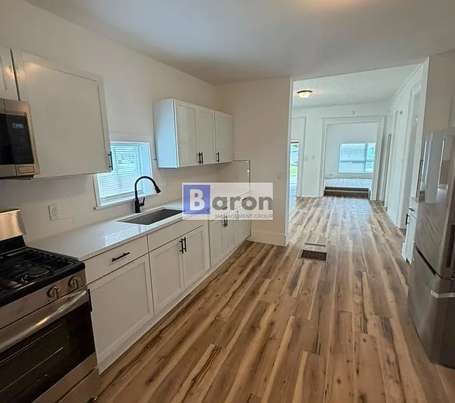 209 S Kaley St — Photo 1