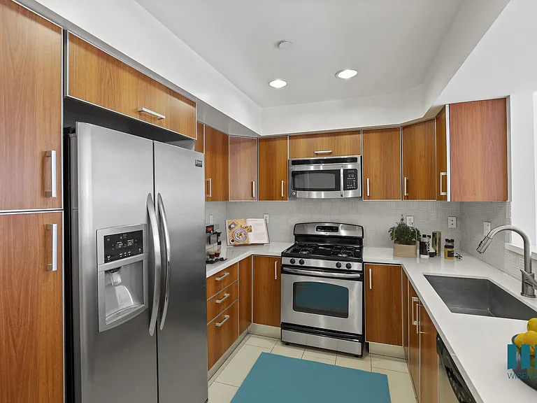 Kitchen with Energy-Efficient Appliances and Ample Cabinet Storage