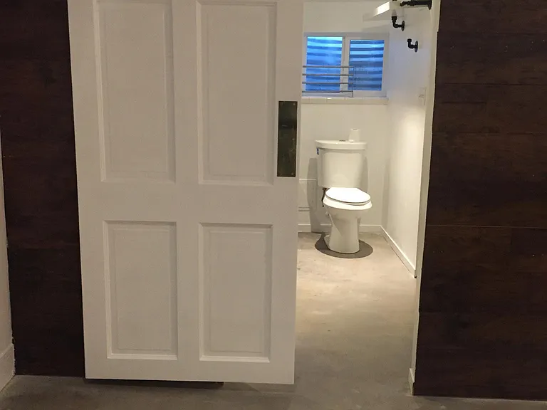 sliding bathroom door for privacy.