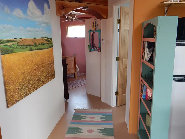 Hallway into the bathroom and bedroom