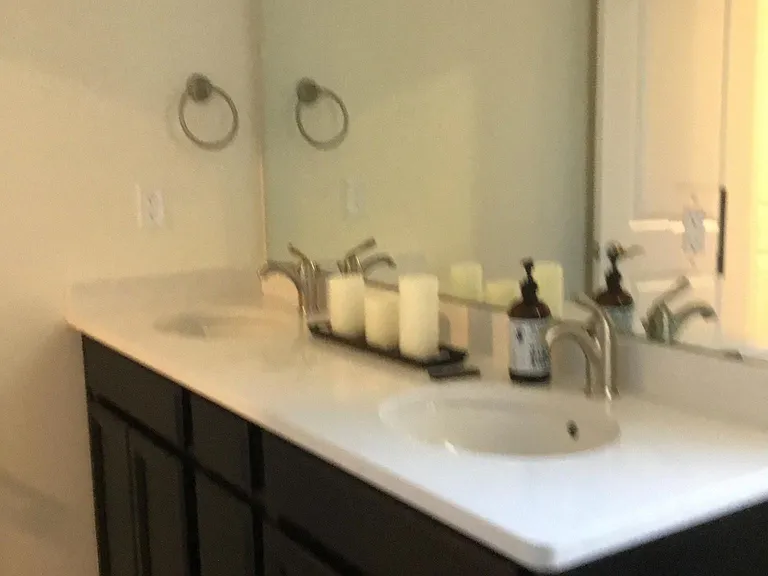 Double sink, vanity upstairs shared bathroom