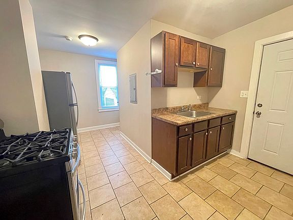 The kitchen is immediately upon entering.