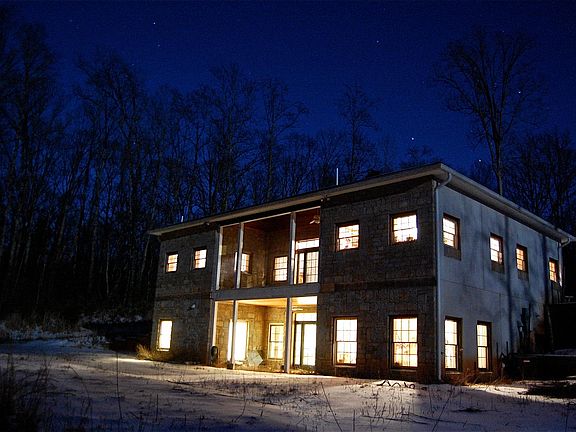 looking at north-facing side of house after a snowfall 