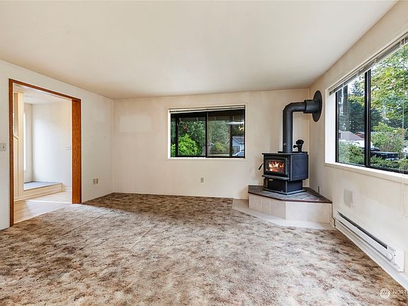 Living Room with 2 year old Certified Wood Stove!>