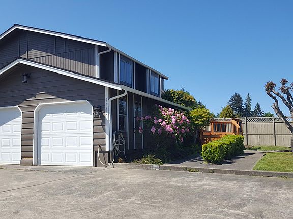 Garage side and parking.
