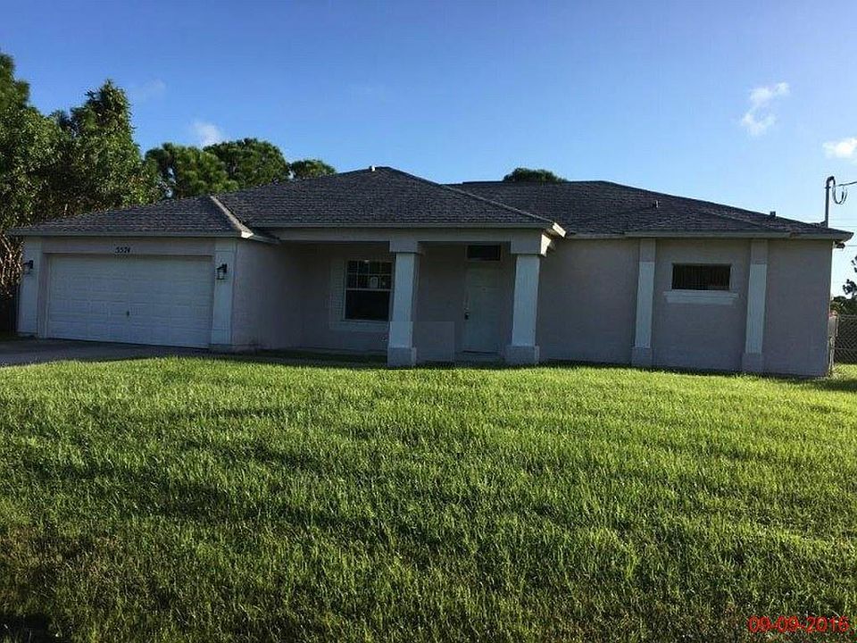 1st image of 5574 NW Cruzan Avenue