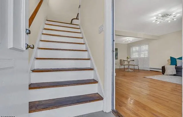 Main entrance. 1st floor to the right.
2nd floor up the stairs.