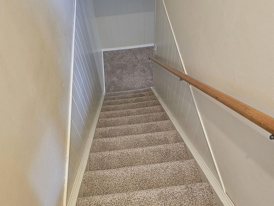 Stairs to basement bedroom