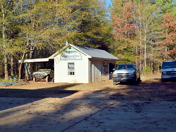 WORKSHOP W/ 2 COVERED AREAS