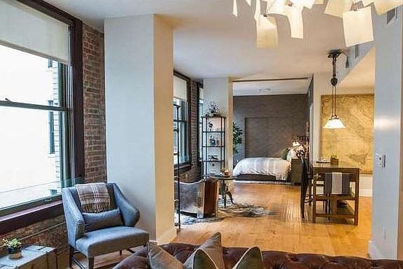 Built in blackout designer fabric partition for the bedroom can slide into place for bedroom privacy. (Not Shown as it is retracted and hidden)