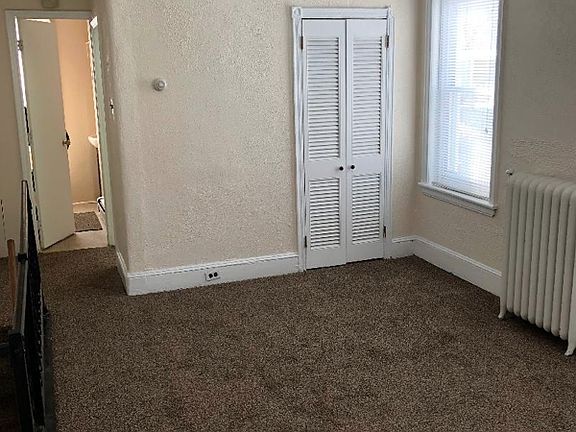 12' x 13' Living room with two closets (view from bedroom).