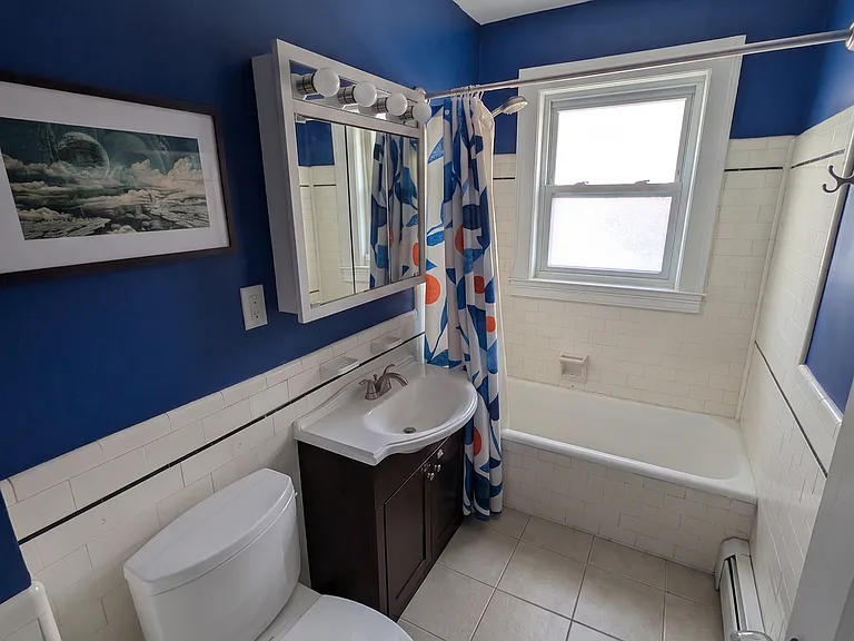 Bathroom with new toilet.