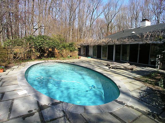 Grand in-ground pool and patio