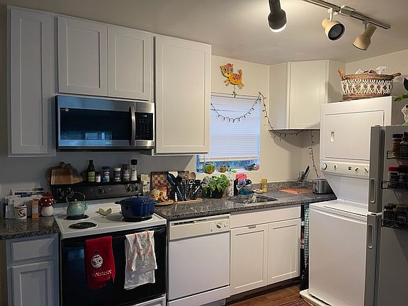 Kitchen with washer and dryer off to side