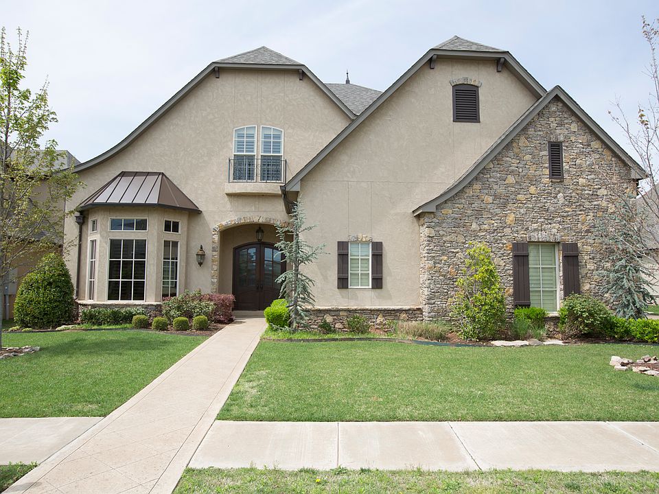 Exceptionally appointed luxury home with Lagoon Pool and custom Theater in gated Wind River. Quality