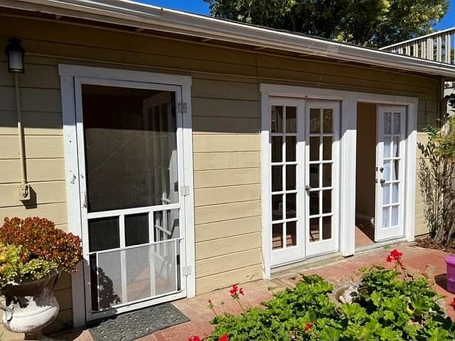 Left door goes into the kitchen. French doors go into the living room
