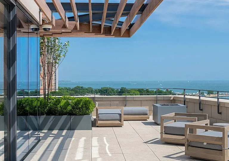 Enjoy stunning views of Lake Michigan and the Chicago skyline from the private sky terrace, complete with multiple al fresco dining areas.