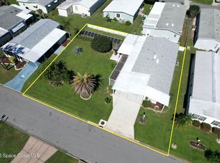 338 Macadamia Dr, Barefoot Bay, FL 32976