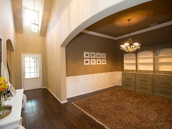 Wide plank wood floor in entry