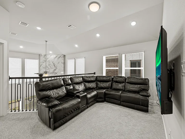 Game room area over looks living room