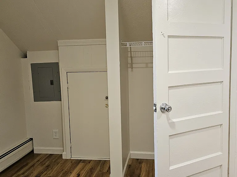 bathroom door opens into hallway