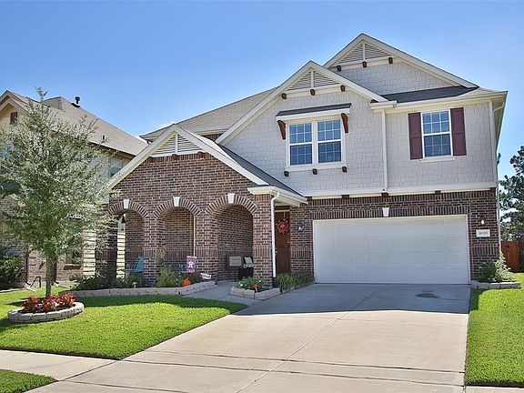 Driving up to this home, you immediately notice its curb appeal. Enjoy the fall evenings in the cozy front porch