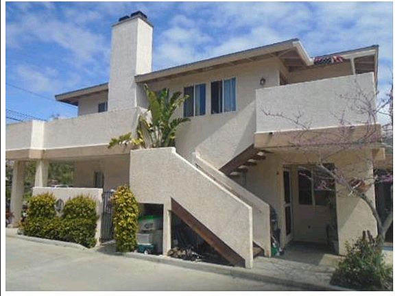 Stairs to upstairs apt and Apt A back door entrance