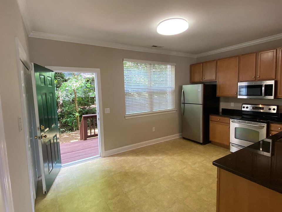 Spacious kitchen with lots of cabinet space. Nice deck right off the kitchen, great for grilling or just getting outside.
