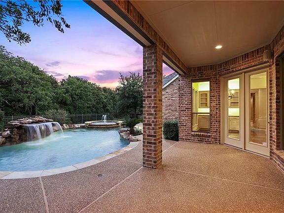 Make a splash in the sparkling heated pool & spa or enjoy your private backyard oasis on the covered patio!